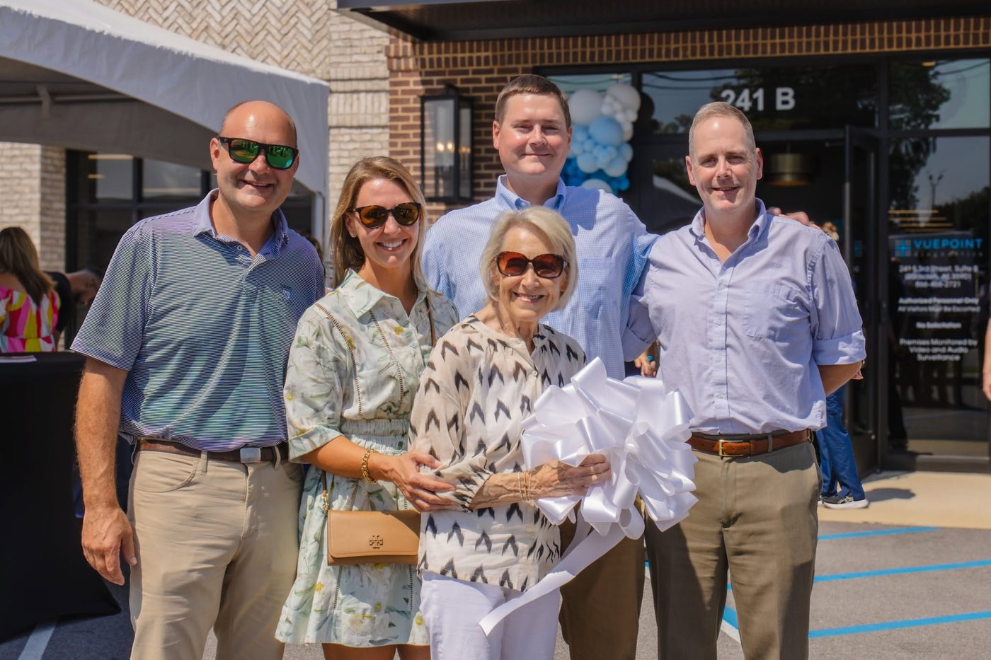 VuePoint leadership and colleagues celebrating at the Gadsden office opening